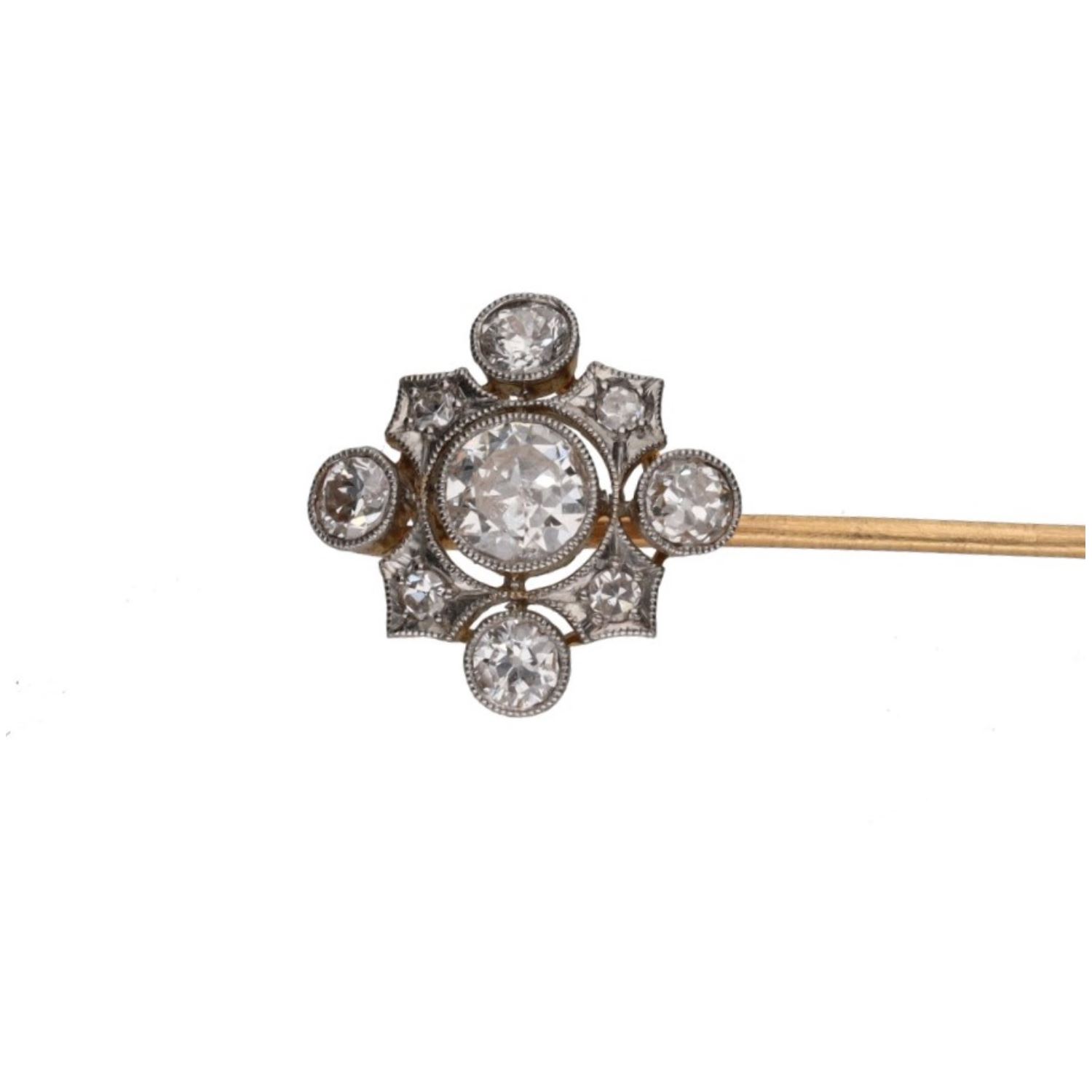 Aguja de corbata realizada en oro amarillo y oro blanco con brillantes.