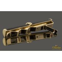 Pasador de corbata realizado en oro amarillo y pelo de elefante.