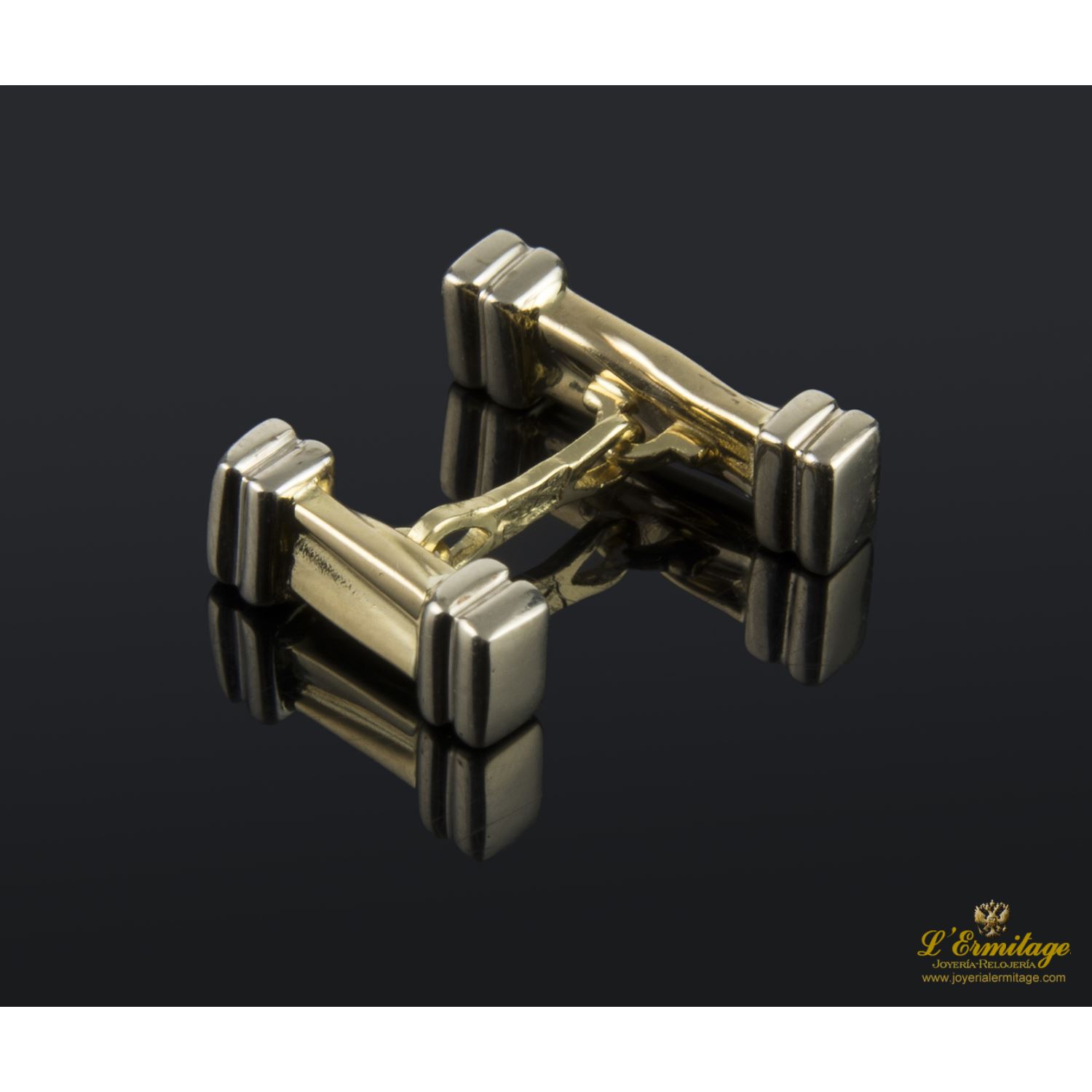 Gemelos en forma de barras realizados en oro amarillo y oro blanco.