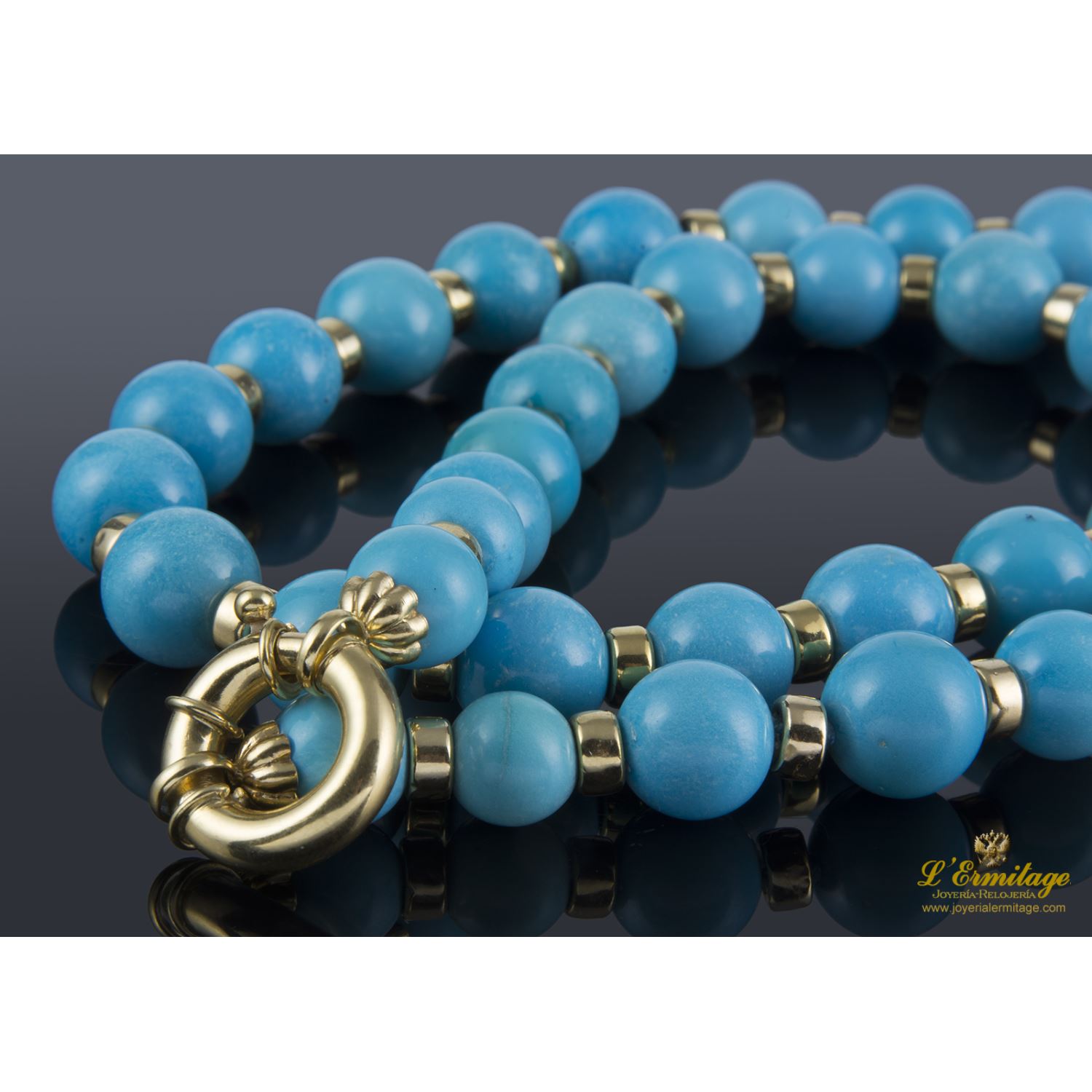 Collar en oro amarillo con cuarzo turquesa.