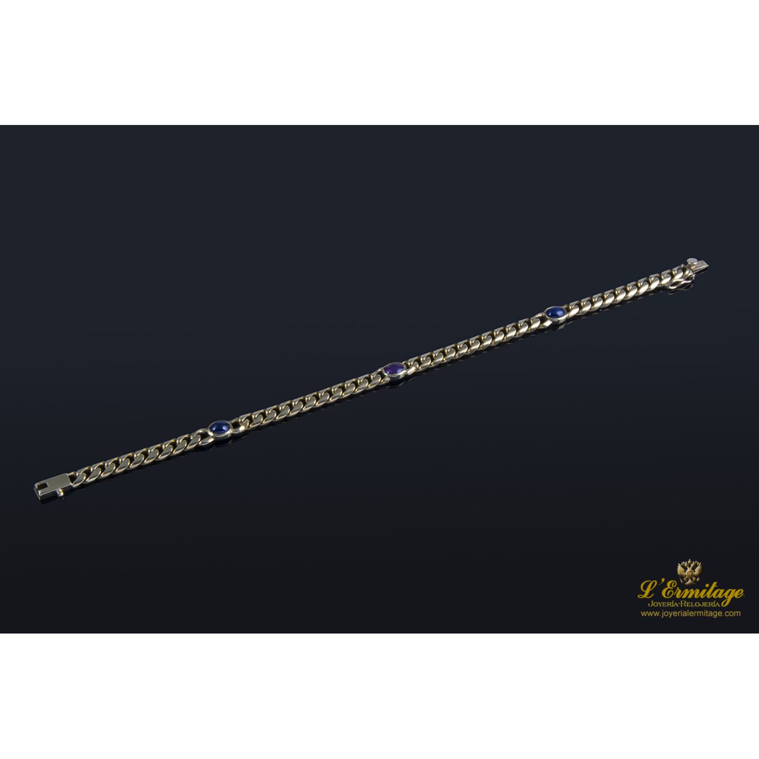 Pulsera en oro amarillo con rubí y zafiros