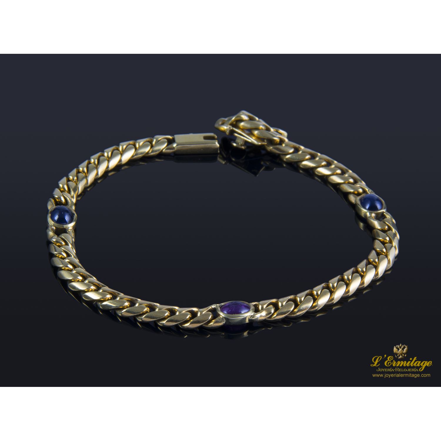 Pulsera en oro amarillo con rubí y zafiros