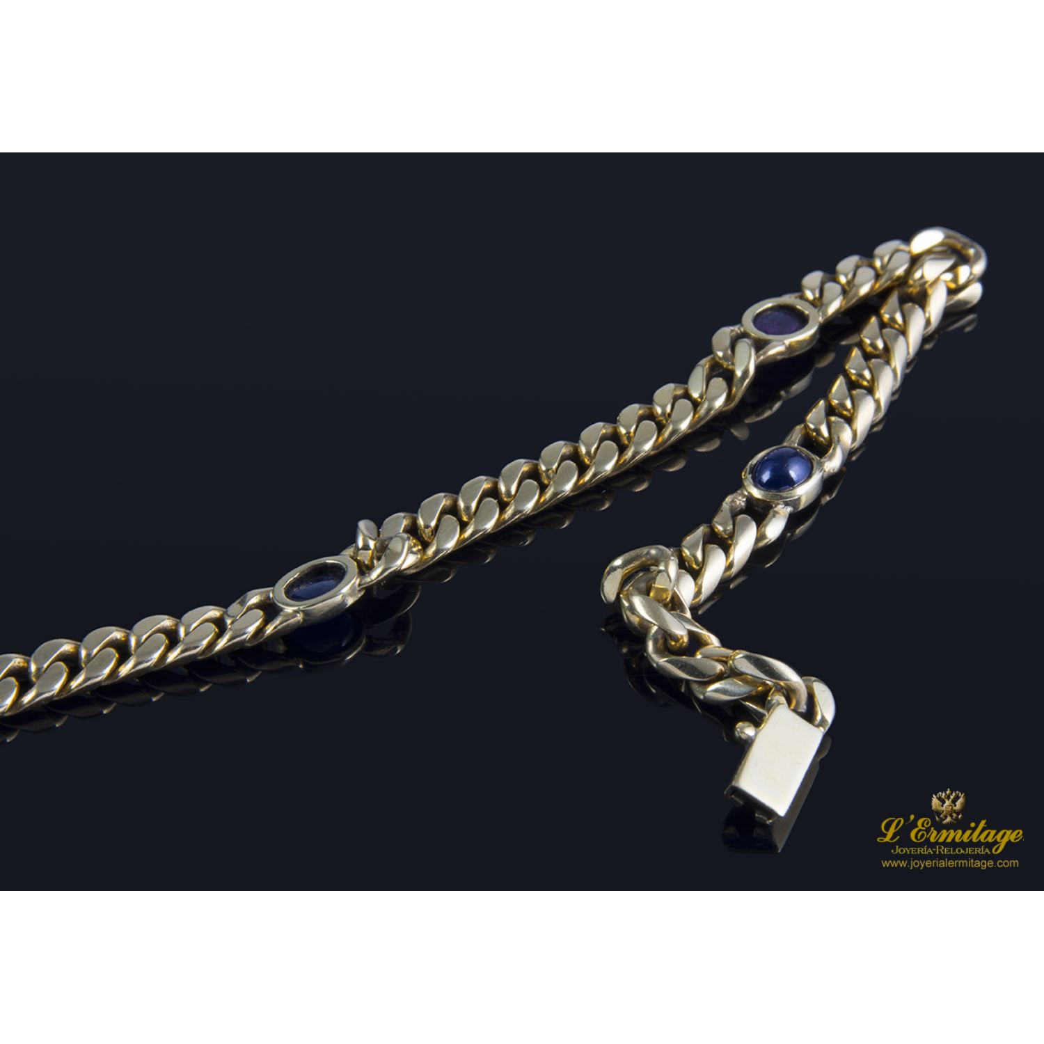 Pulsera en oro amarillo con rubí y zafiros