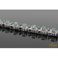 Pulsera oro blanco esmeraldas y diamantes.