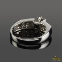 Sortija oro blanco y diamantes color i, pureza vs1 y peso 0,43 cts.