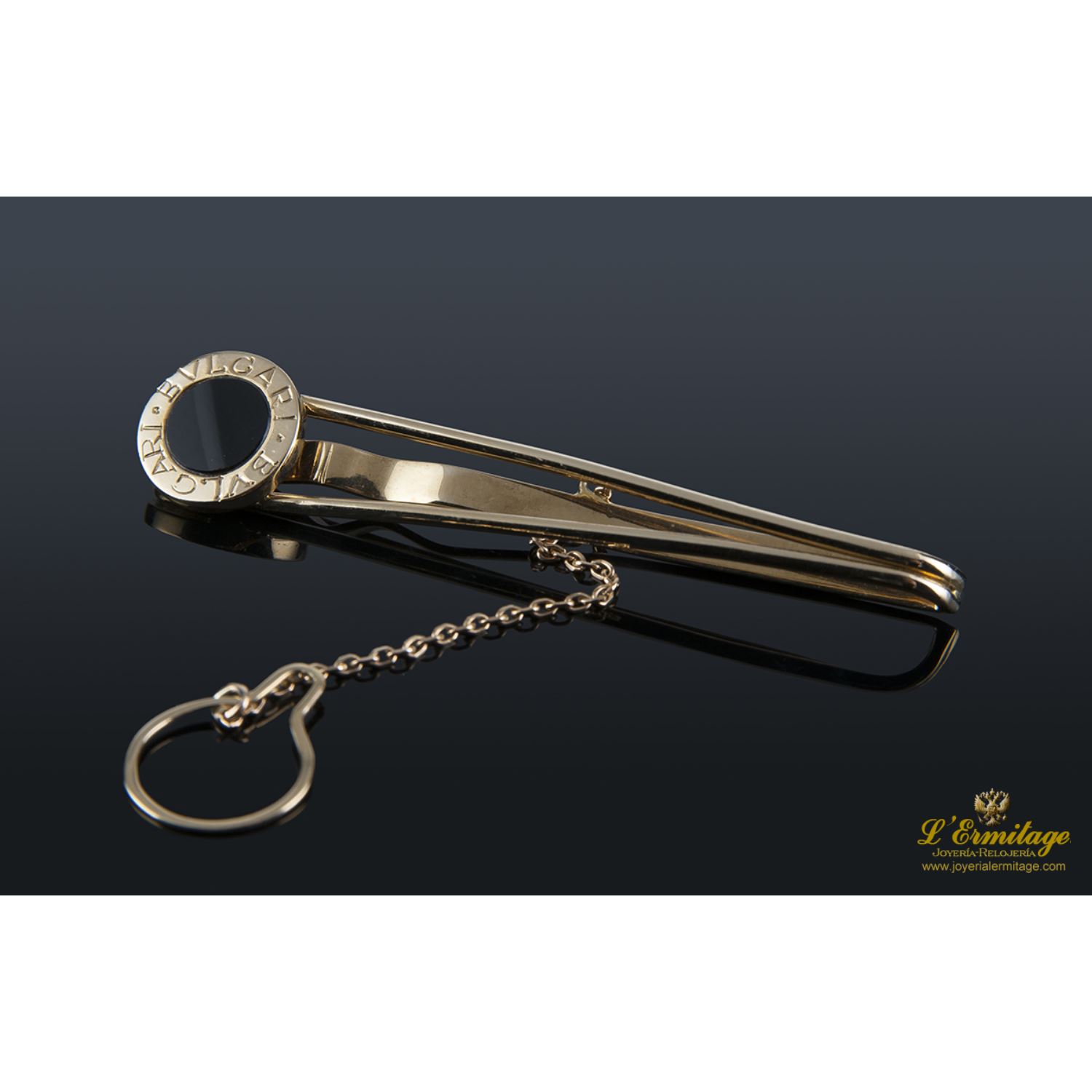 Pisacorbatas oro amarillo y ceramica