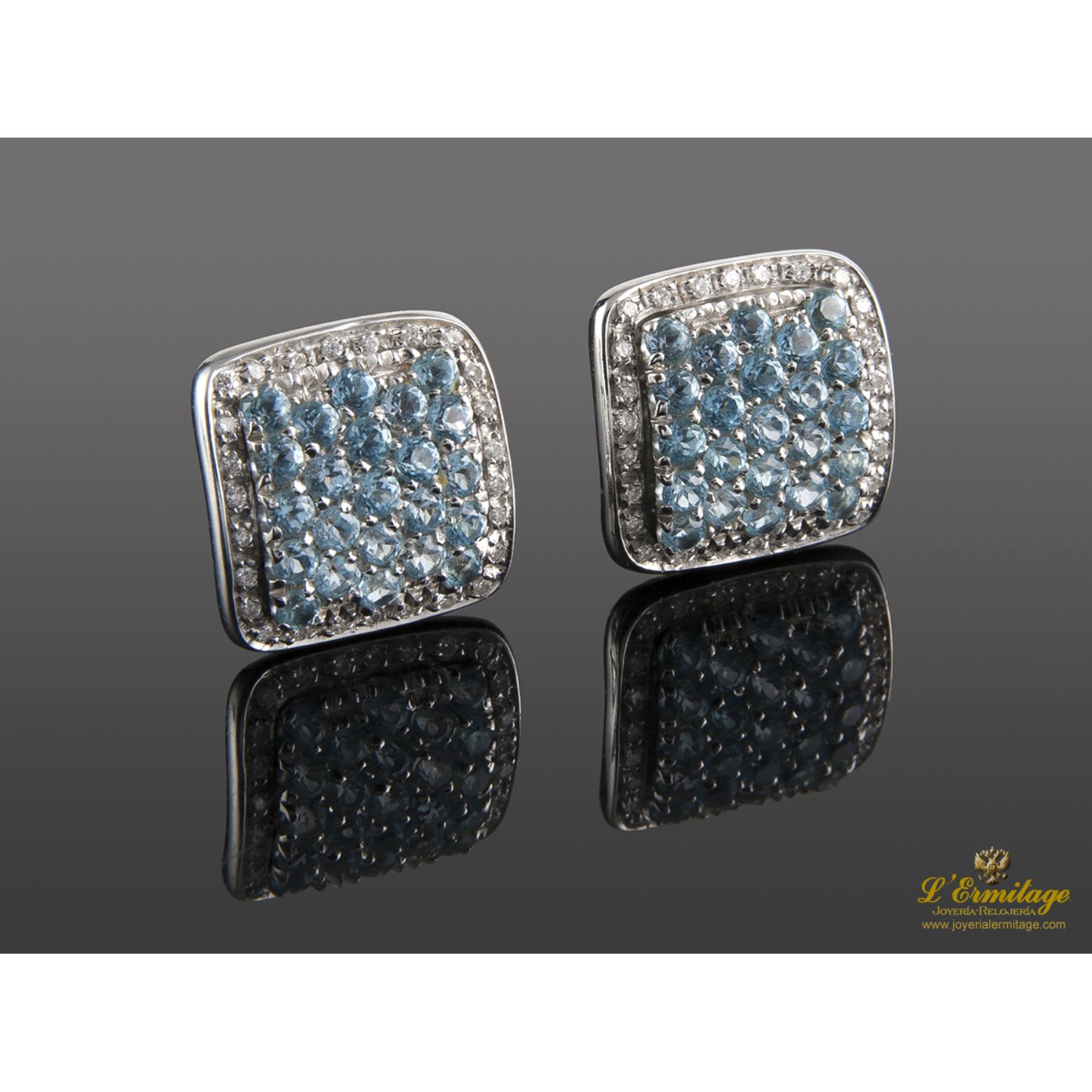 Pendientes en oro blanco con citrinos y diamantes.