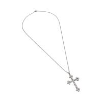 Collar en oro blanco y cruz con brillantes.