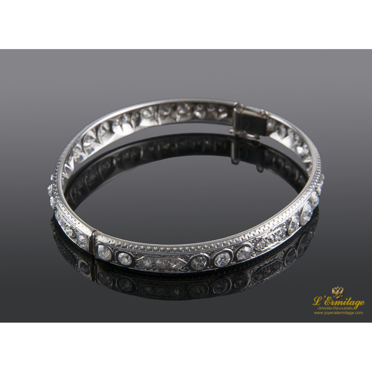 Pulsera platino de media caña y diamantes talla antigua