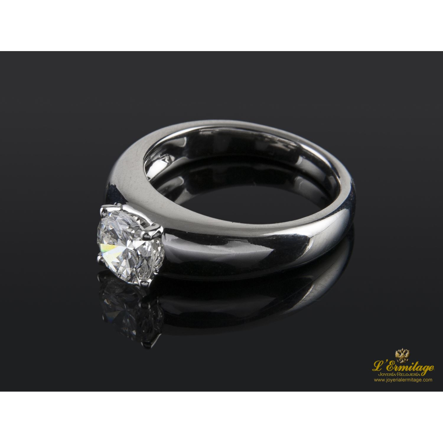 Sortija solitario oro blanco color g, pureza vs1 y peso 1,00 cts.