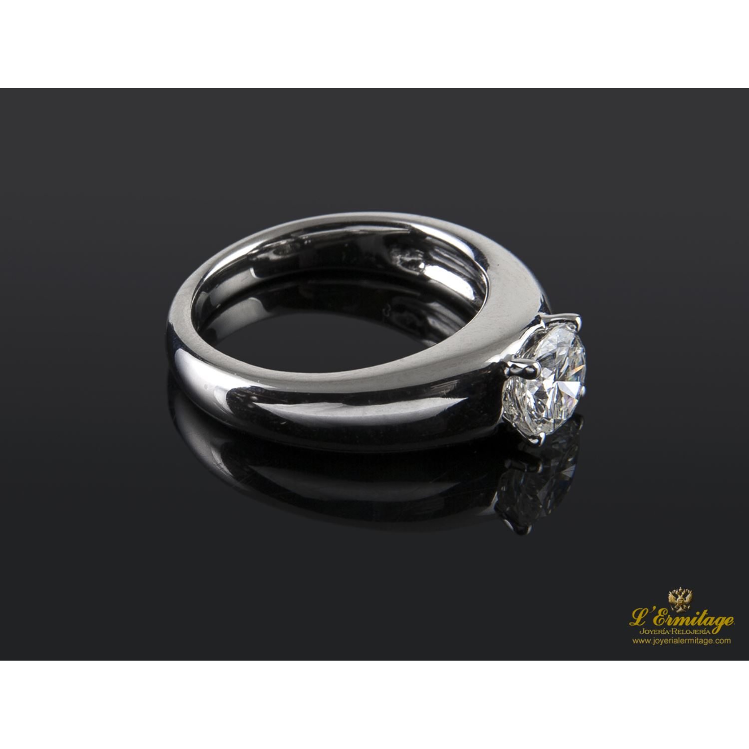 Sortija solitario oro blanco color g, pureza vs1 y peso 1,00 cts.