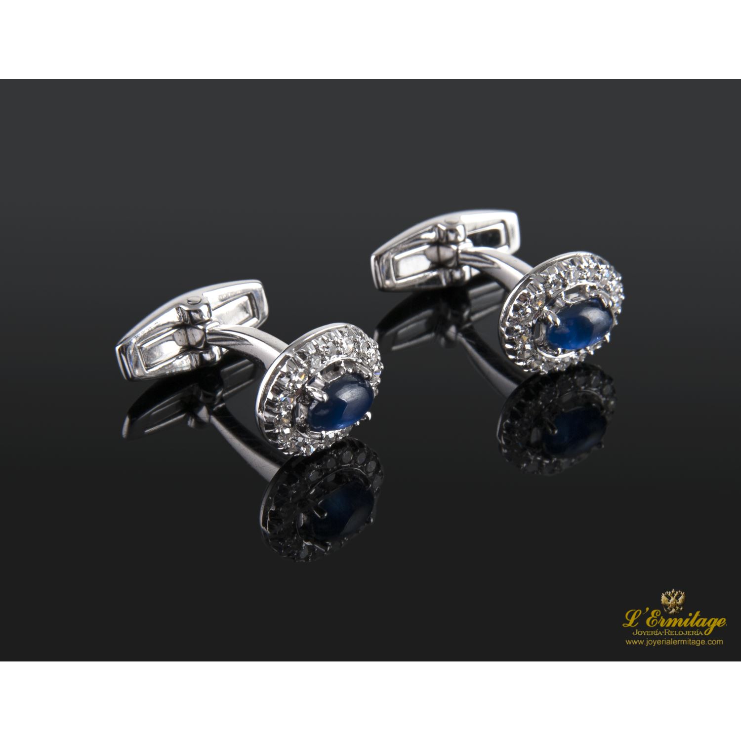 Gemelos oro blanco zafiros y diamantes.