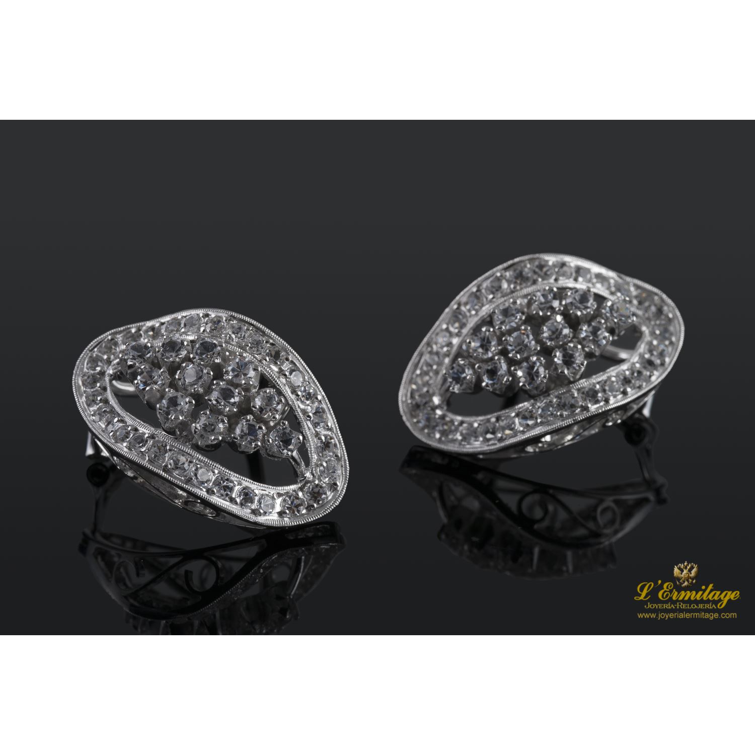 Pendientes oro blanco amarillo y zirconitas.