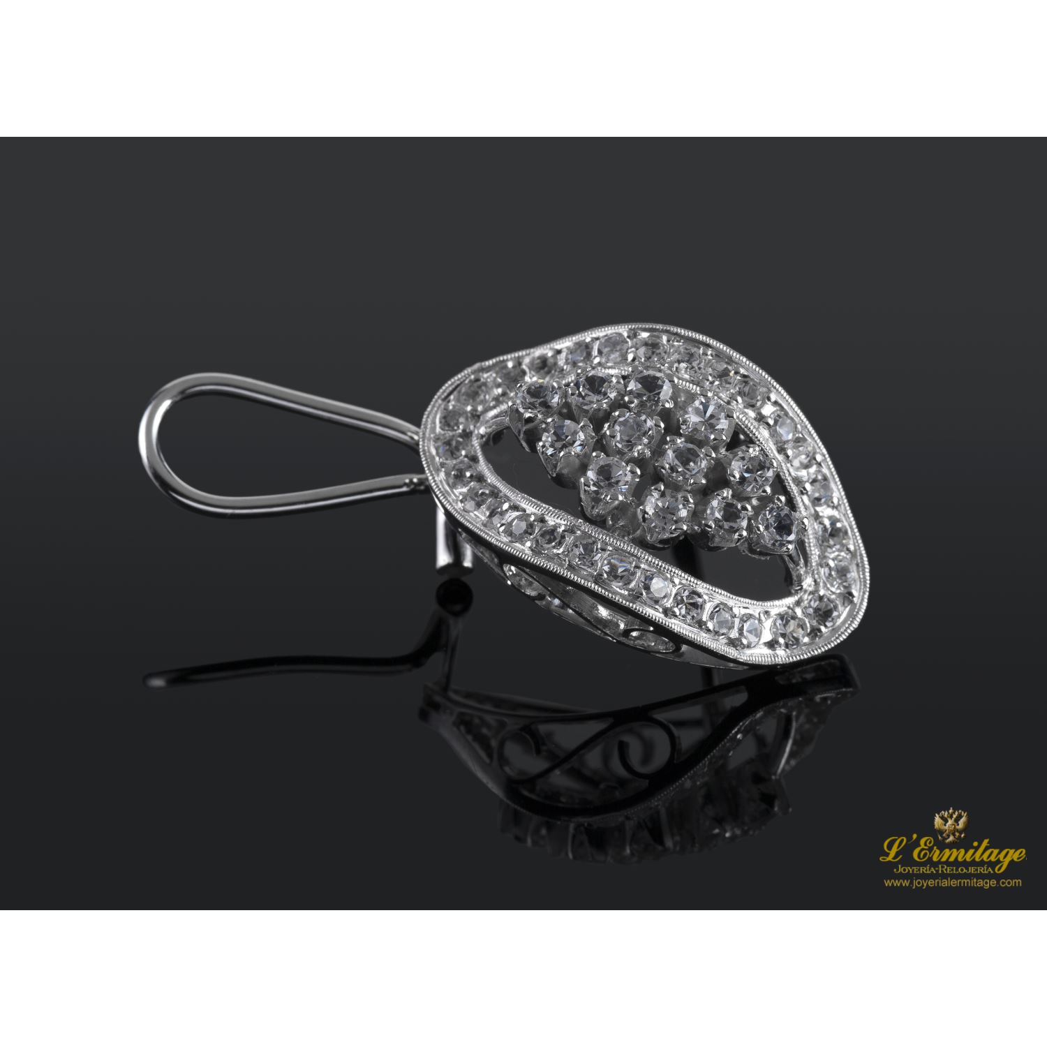 Pendientes oro blanco amarillo y zirconitas.