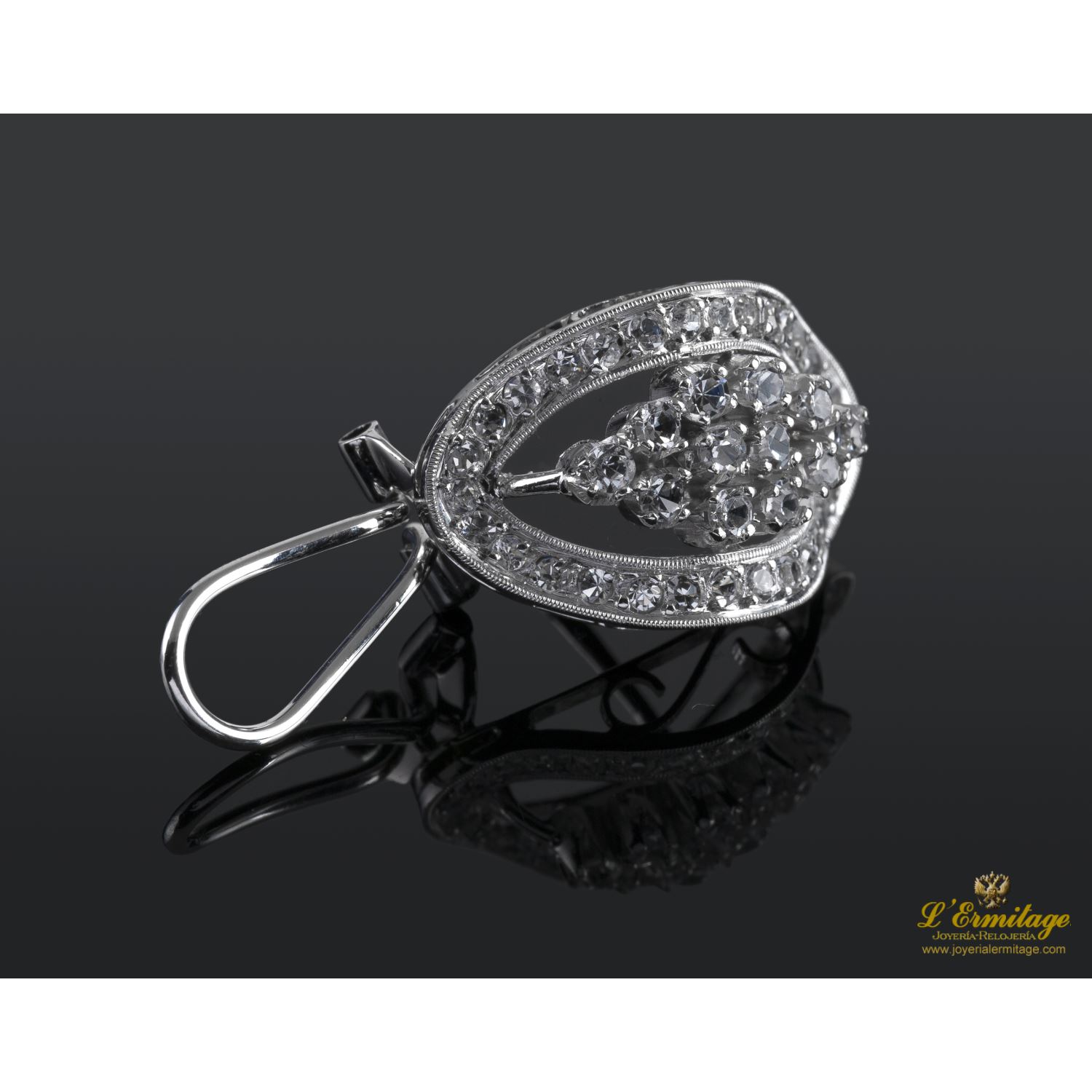 Pendientes oro blanco amarillo y zirconitas.