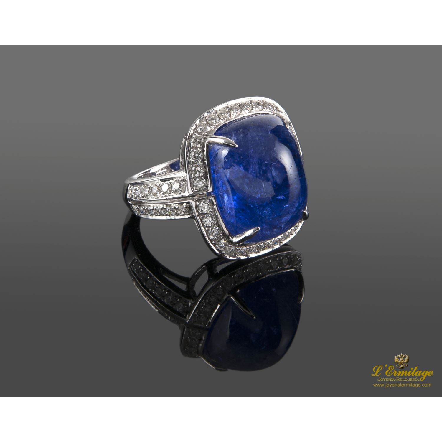 Sortija oro blanco tanzanita y diamantes.