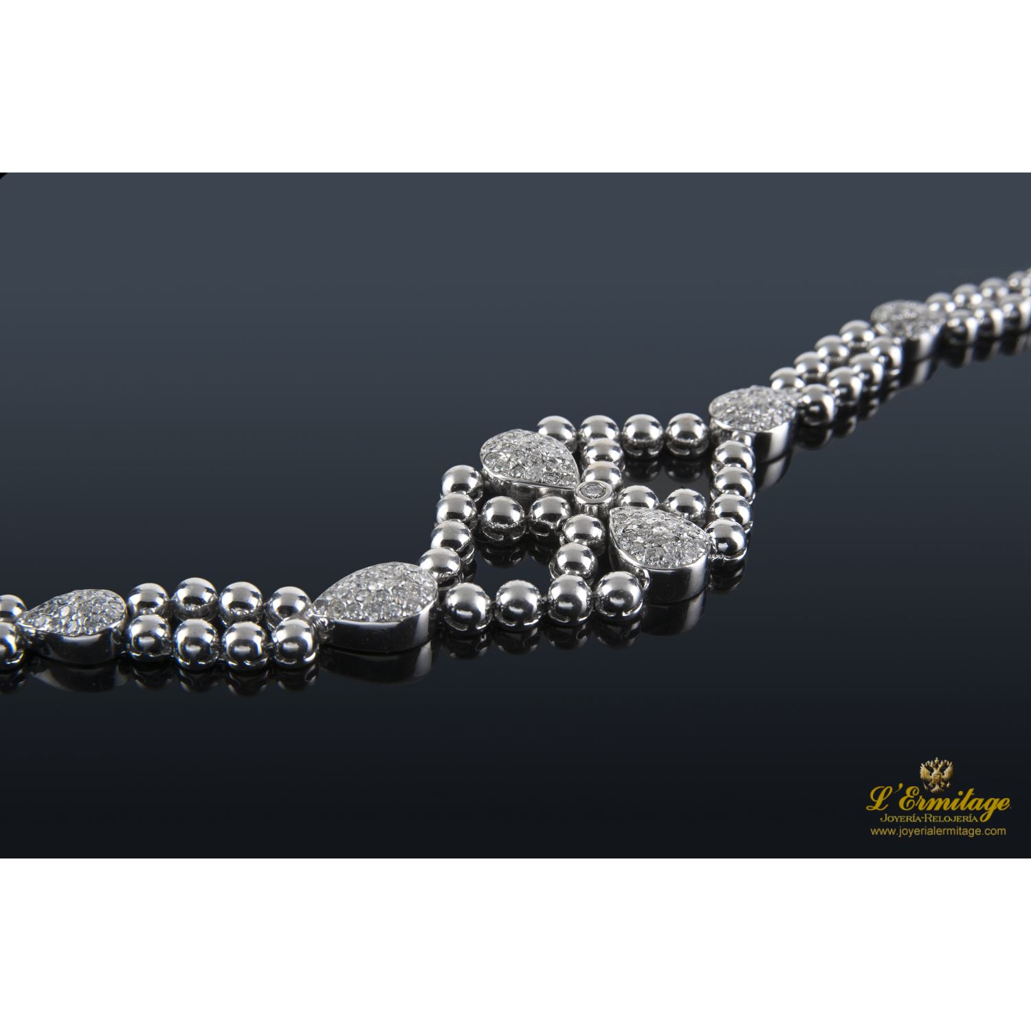 Pulsera oro blanco y diamantes.