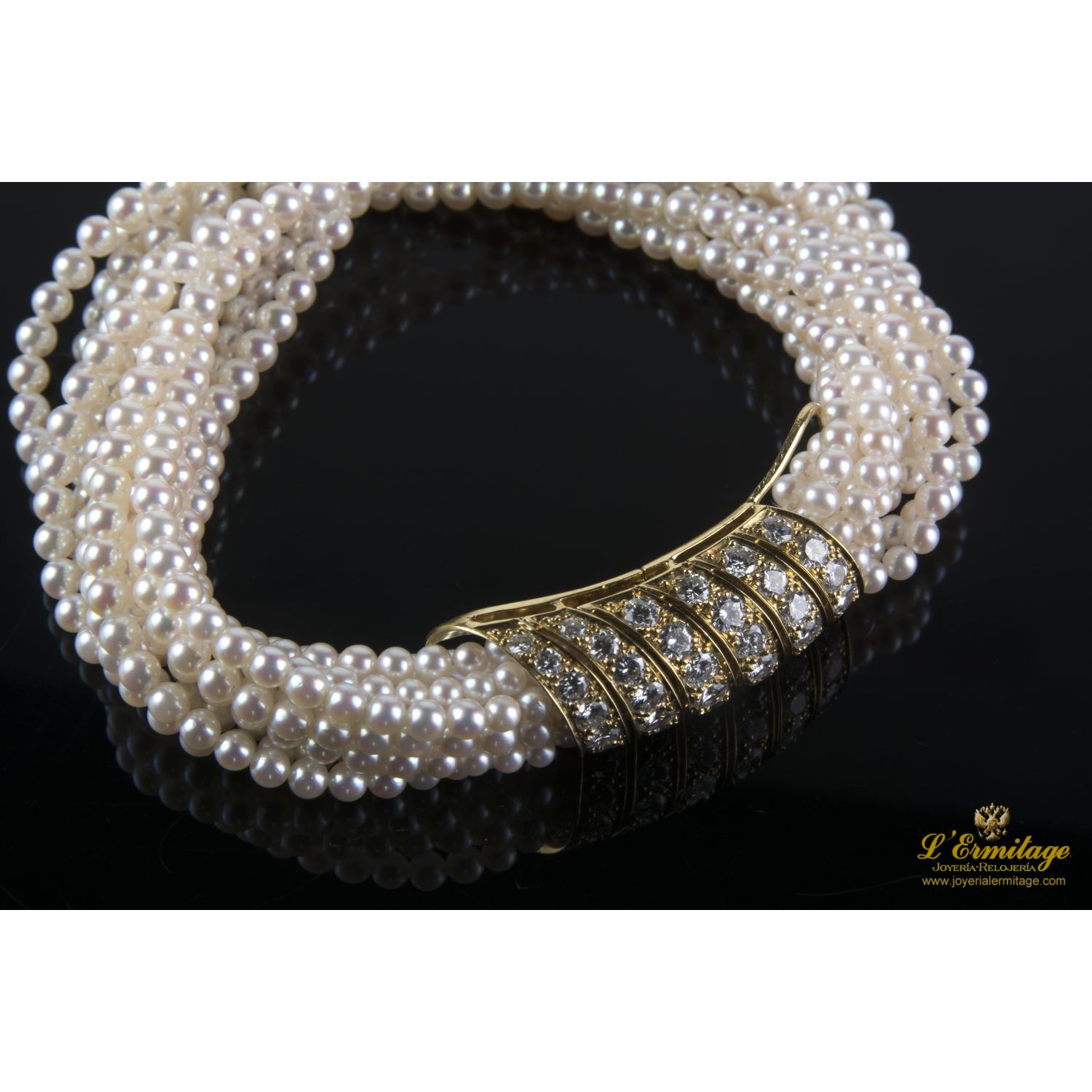 Pulsera cartier trenzada perlas y diamantes
