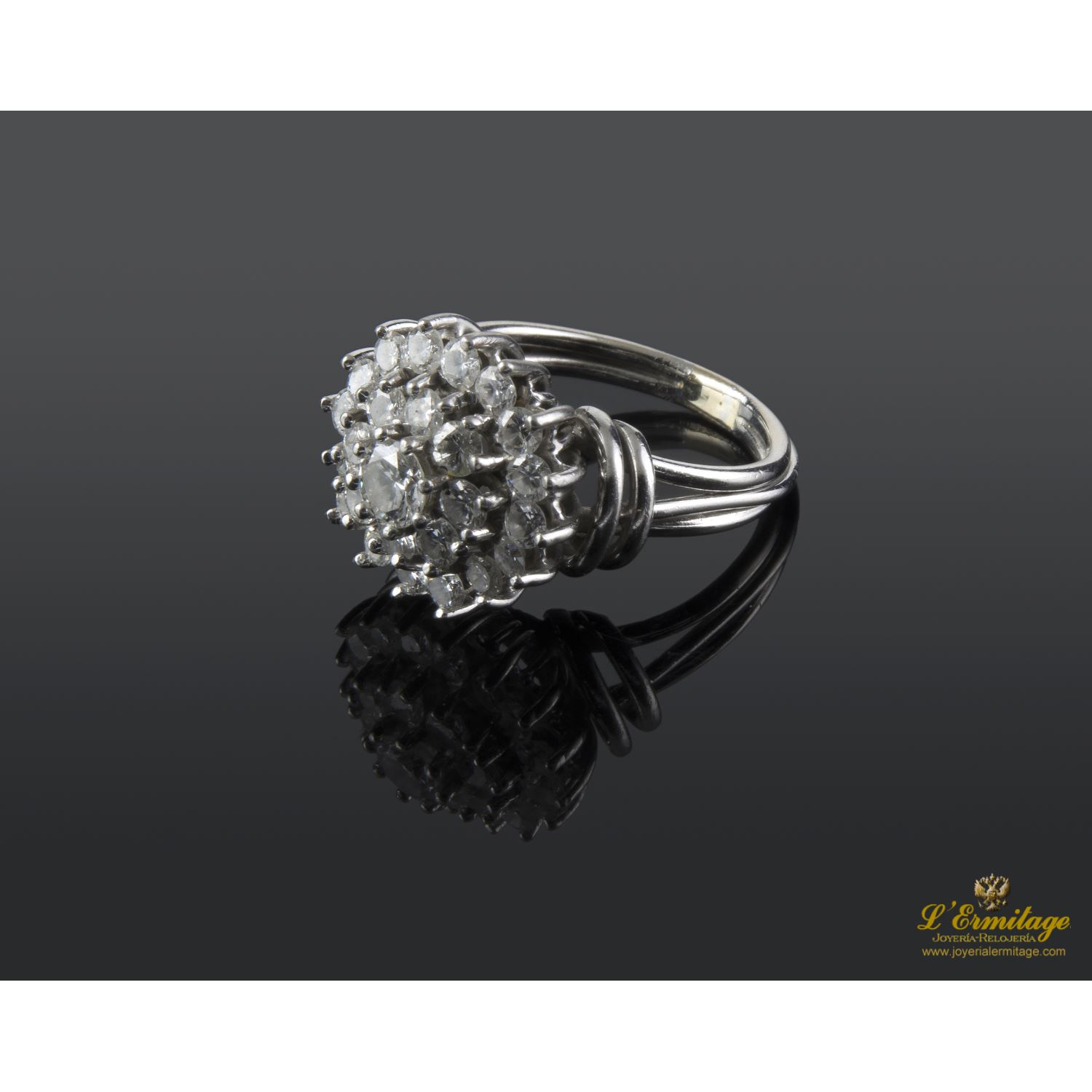 Sortija oro blanco y btes.