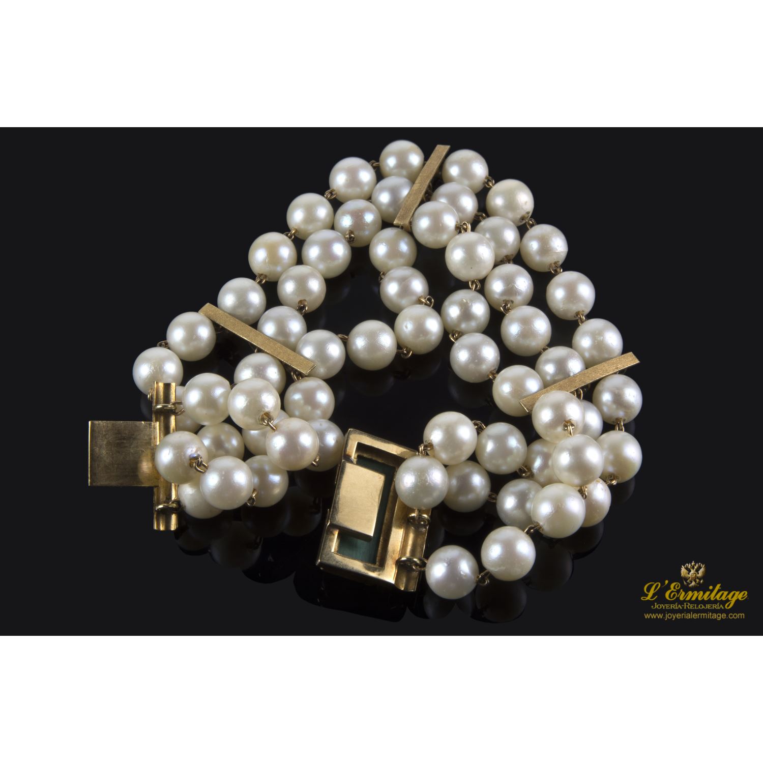 Pulsera tres hilos de perlas