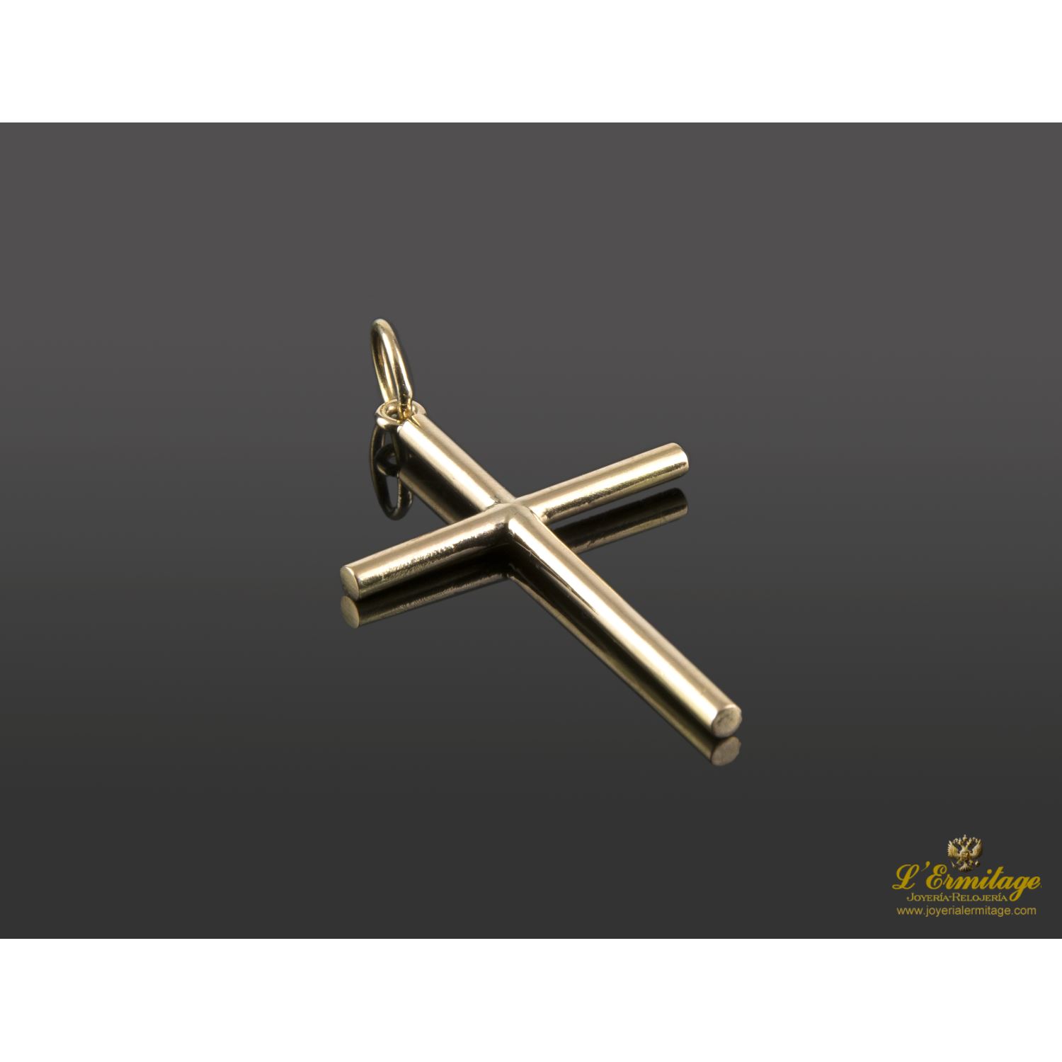 Colgante en forma de cruz realizado en oro amarillo.