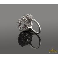 Sortija oro blanco brillantes y rubíes.