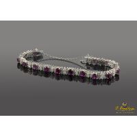 Pulsera oro blanco rubíes y diamantes.