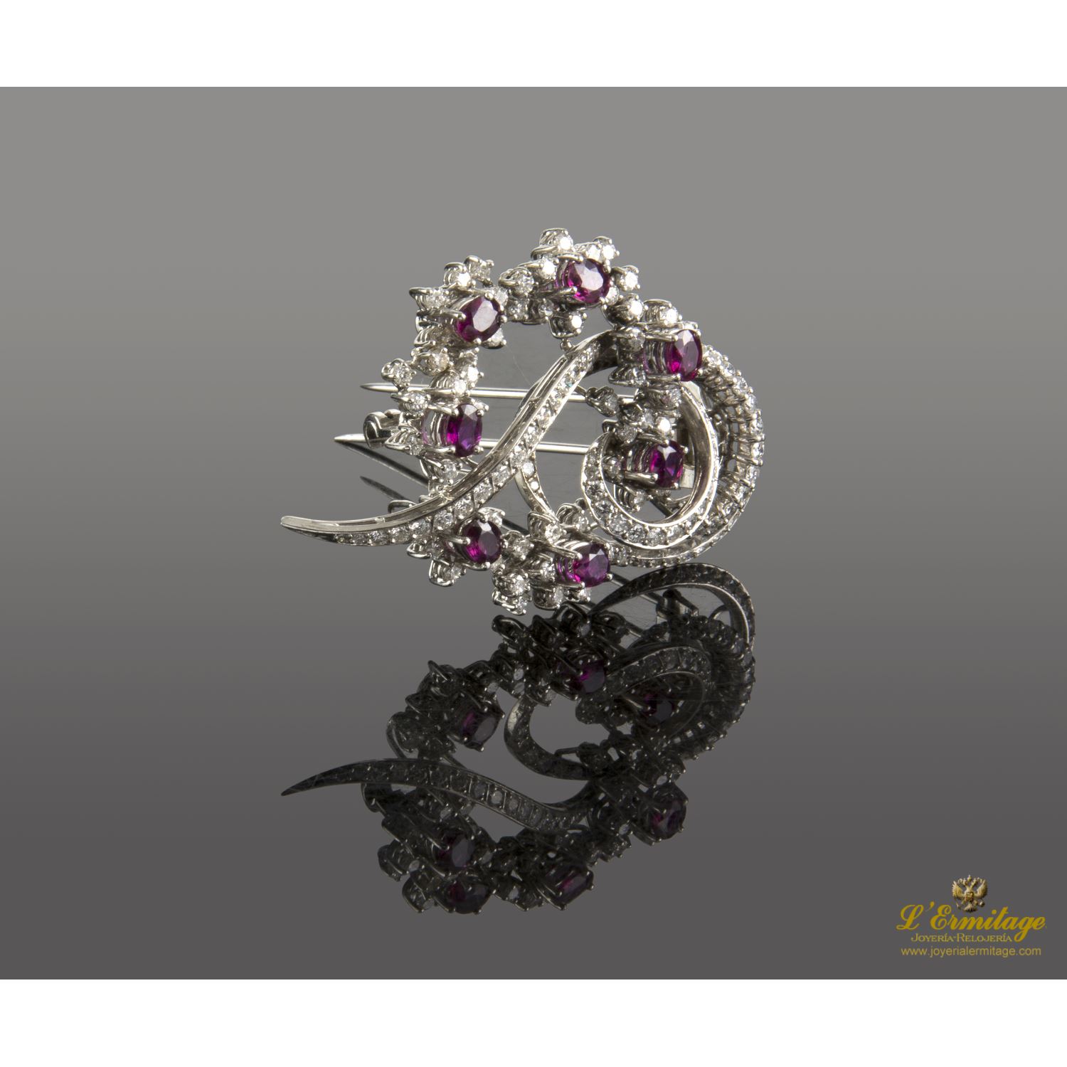 Broche-alfiler oro blanco diamantes y rubíes