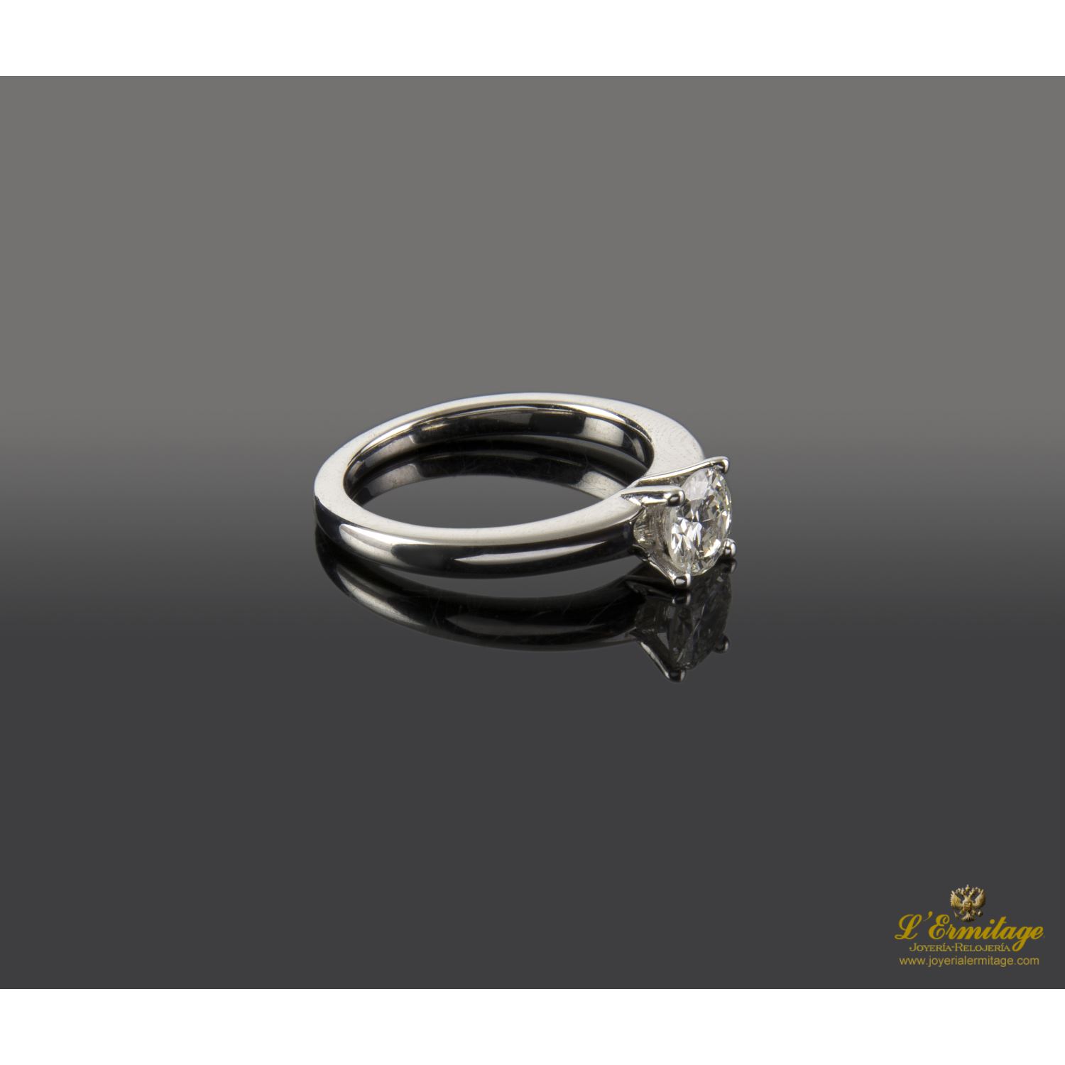 Sortija solitario oro blanco color i, pureza si1 y peso 0,70 cts.