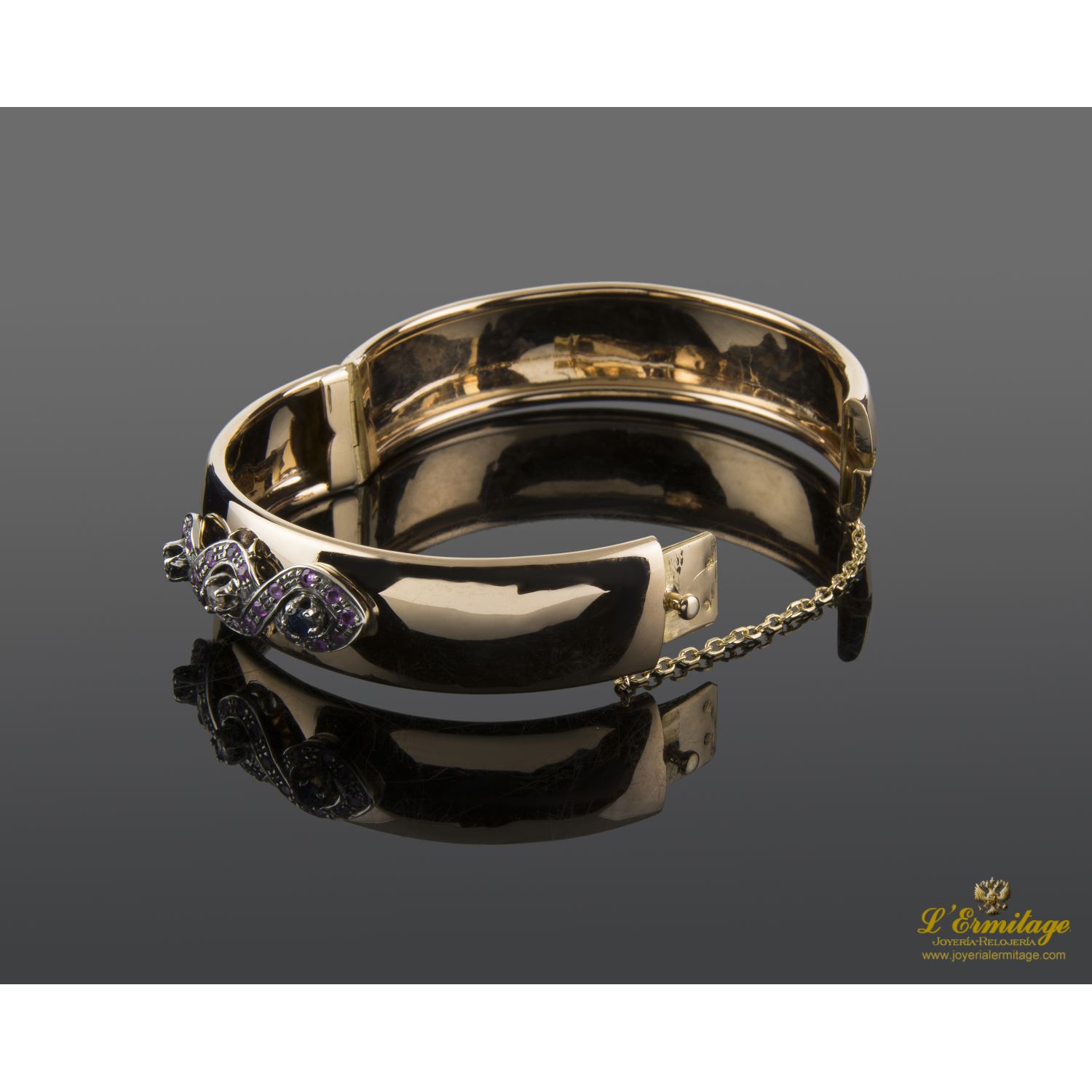 Pulsera oro rosa media caña zafiros rubíes y diamante