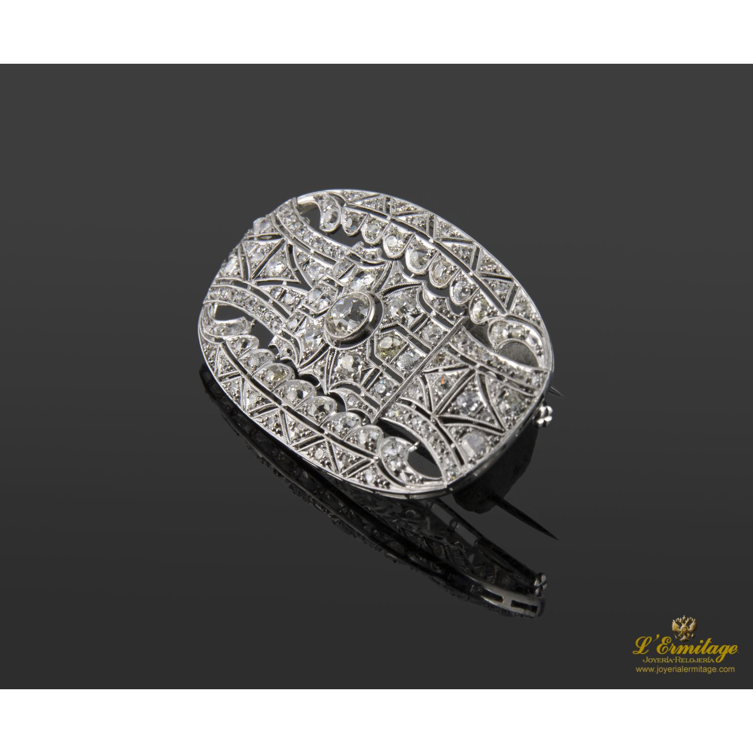 Broche-alfiler antiguo oro blanco y diamantes.