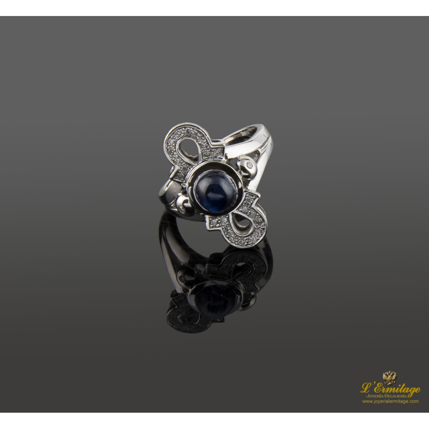 Sortija oro blanco zafiro y diamantes