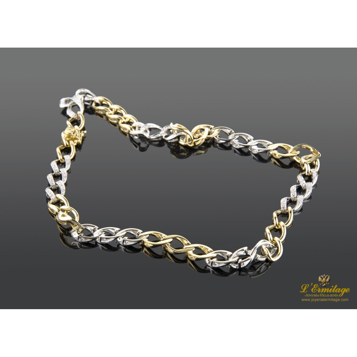 Cadena oro blanco oro amarillo y diamantes. 40Cm.