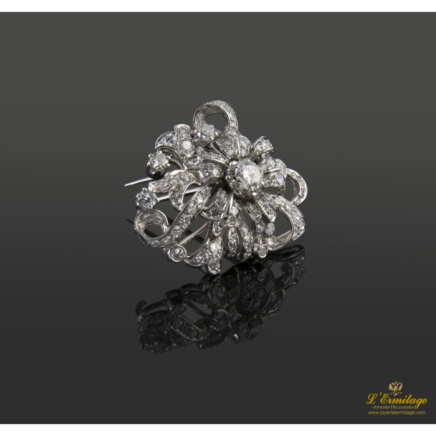 Alfiler oro blanco y diamantes