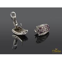 Pendientes oro blanco rubíes y diamantes.