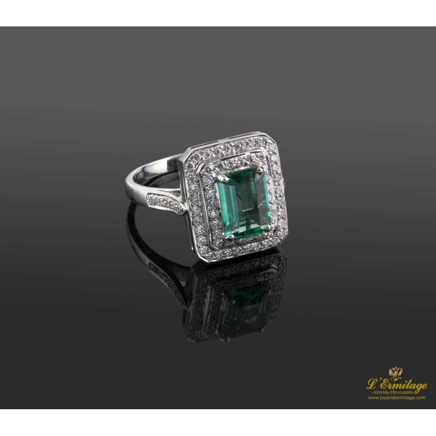 Sortija oro blanco esmeralda y diamantes