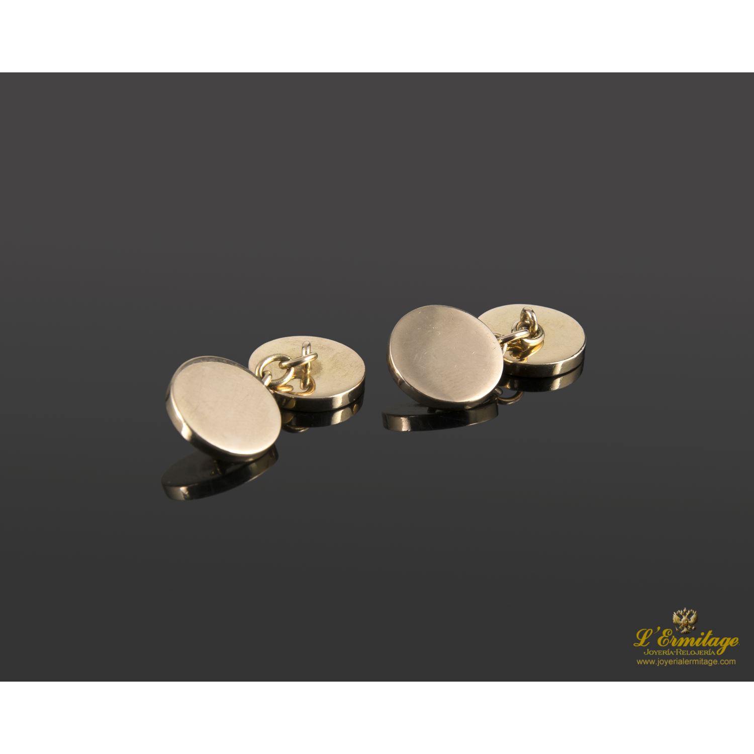 Gemelos en oro amarillo.