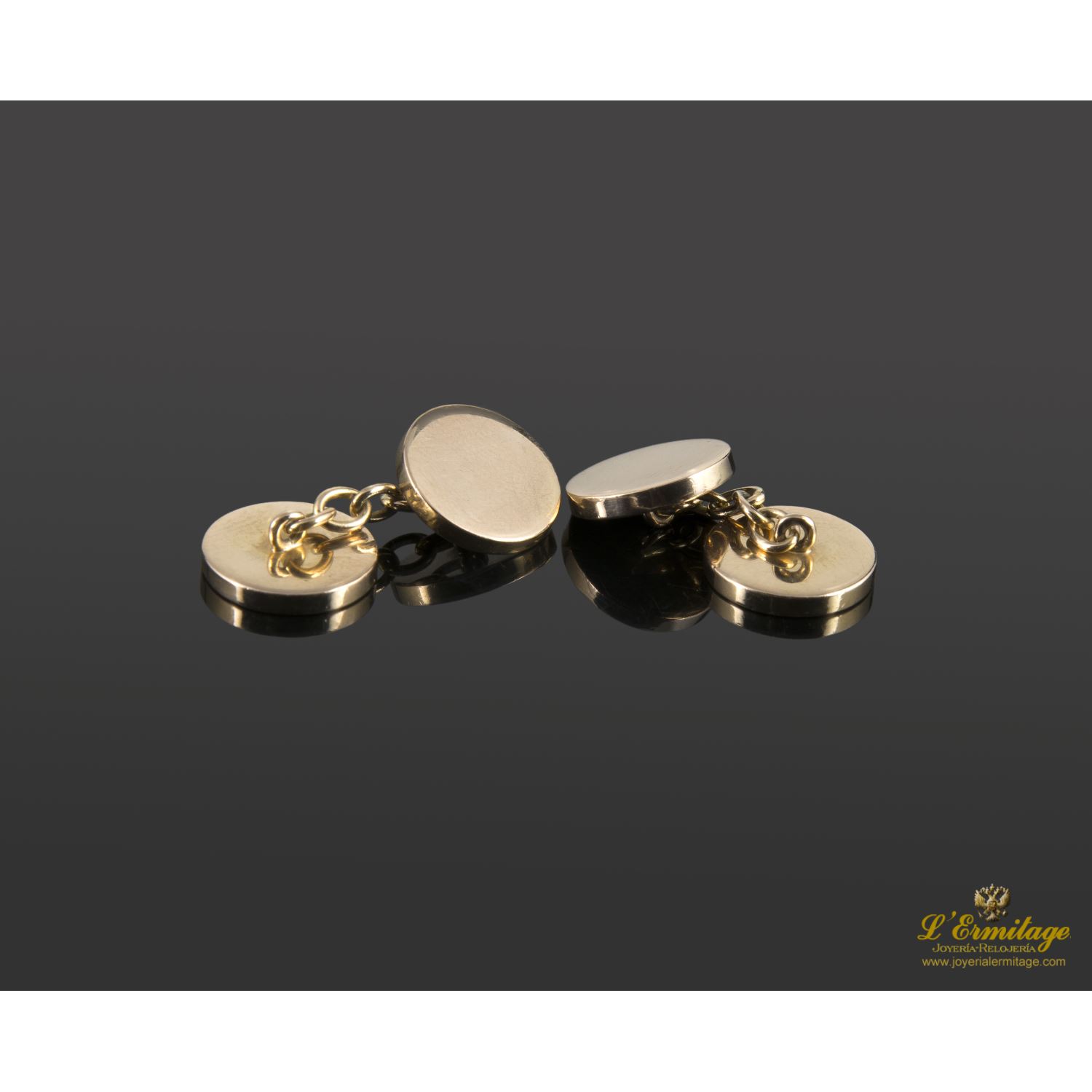 Gemelos en oro amarillo.