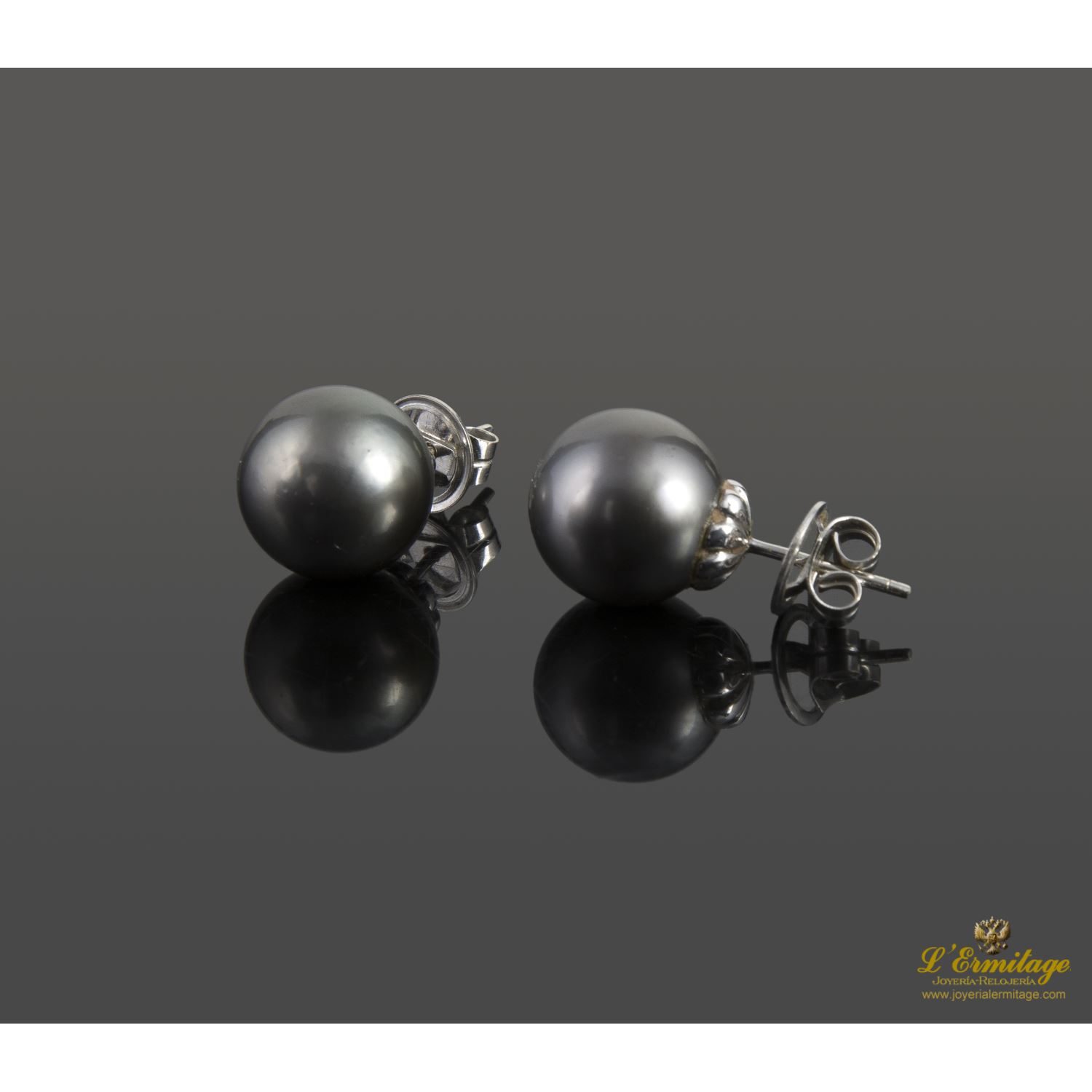 Pendientes oro blanco perlas tahití.