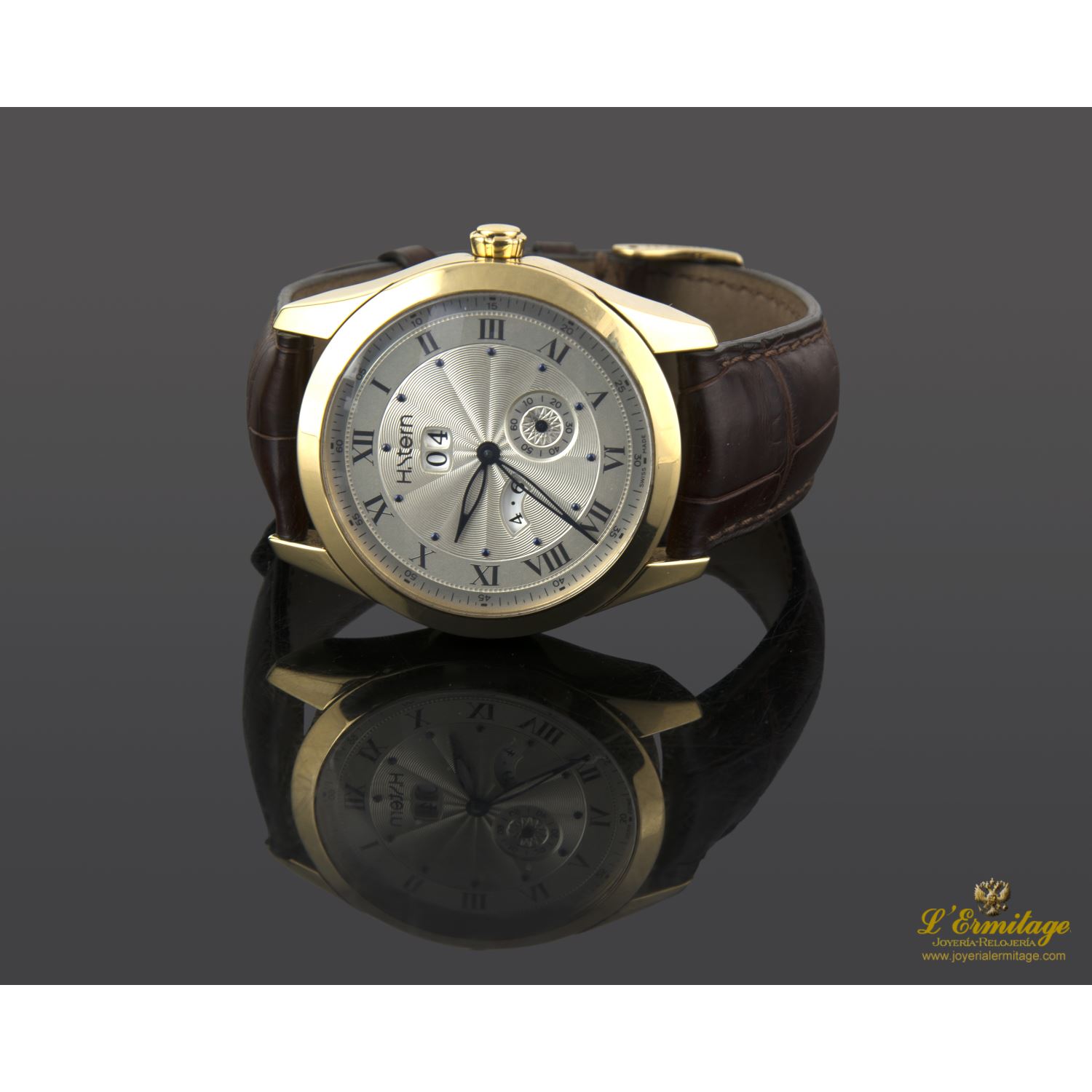 H stern día y mes  oro amarillo automático caballero 40mm.  