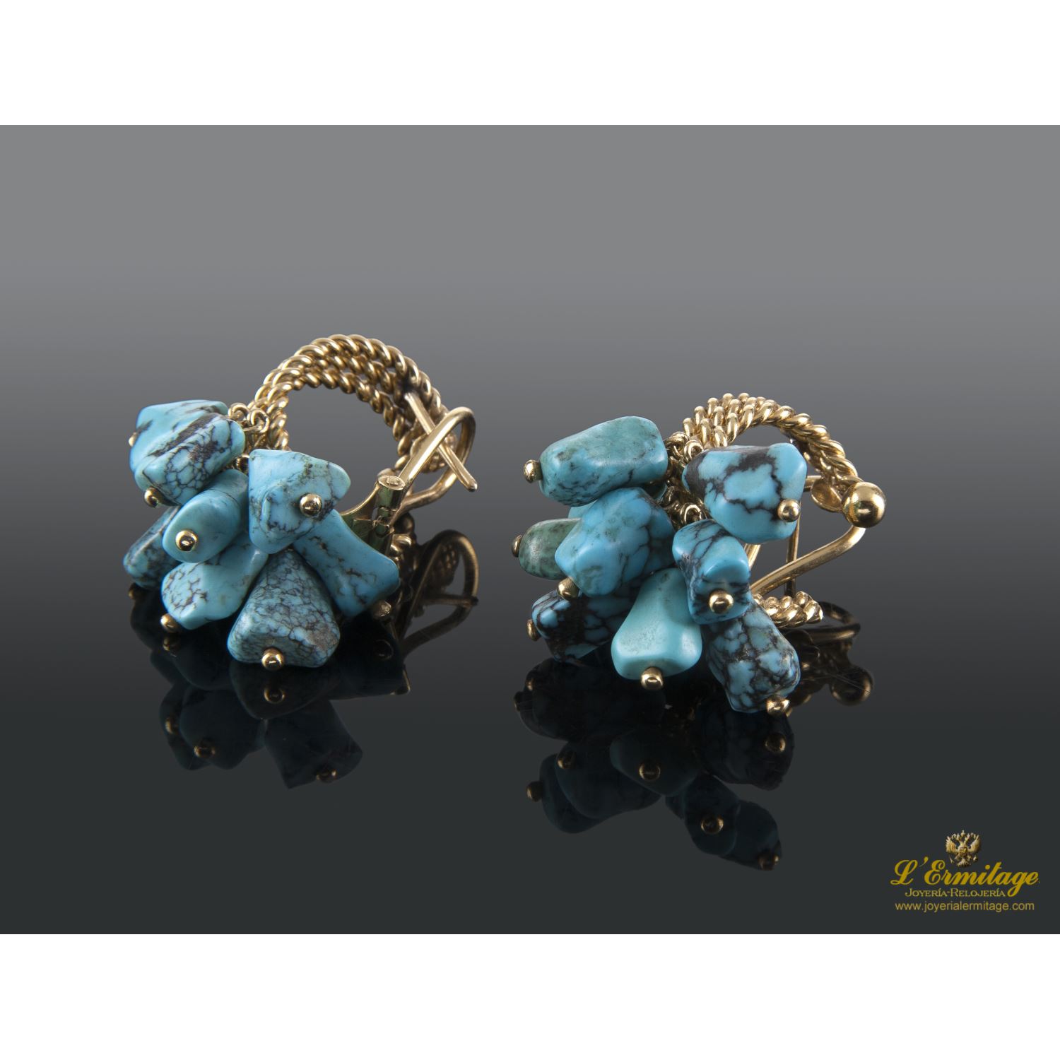 Pendientes oro amarillo y turquesas.