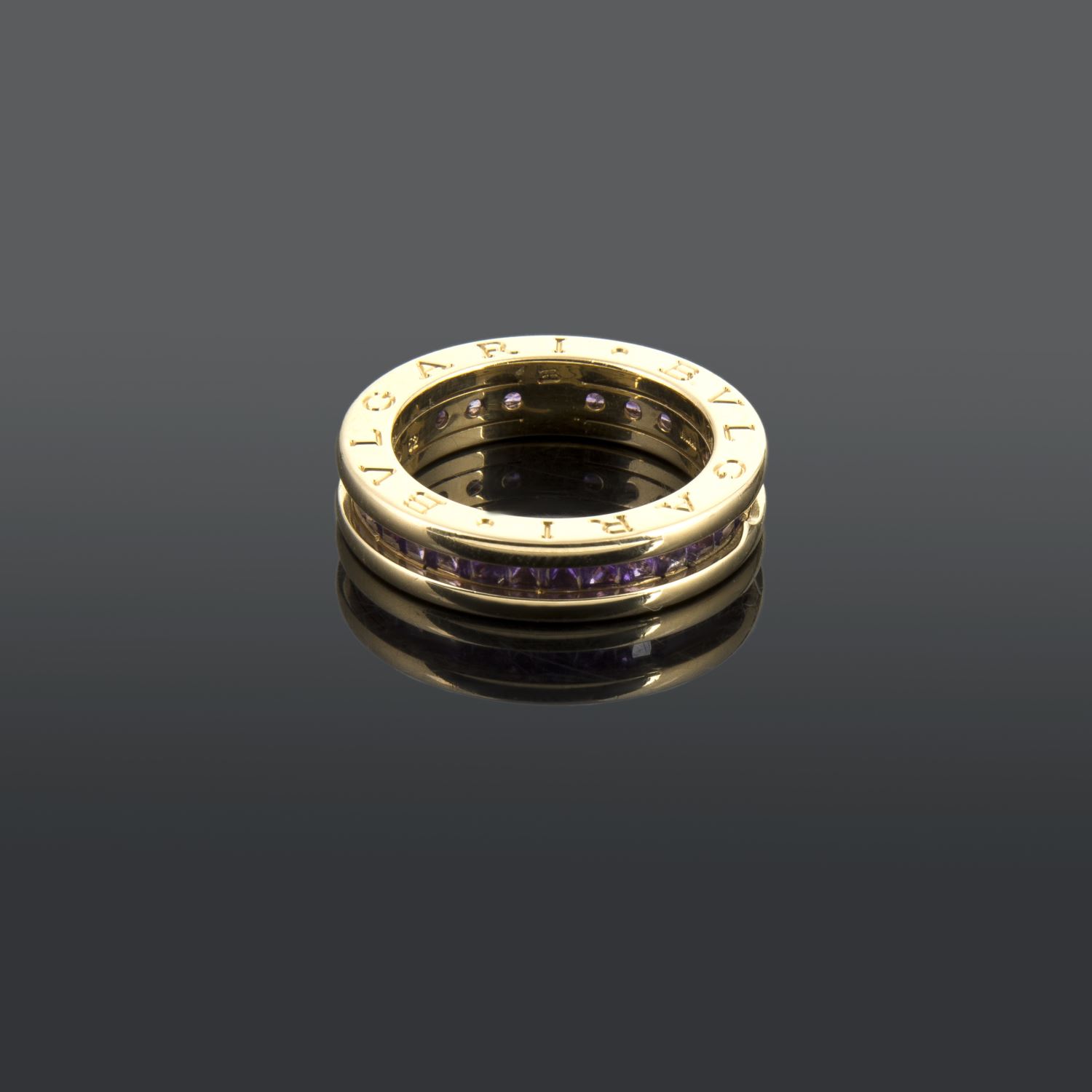 Anillo b.Zero1 de una banda en oro rosa de 18 qt y amatistas. Talla nº: 52