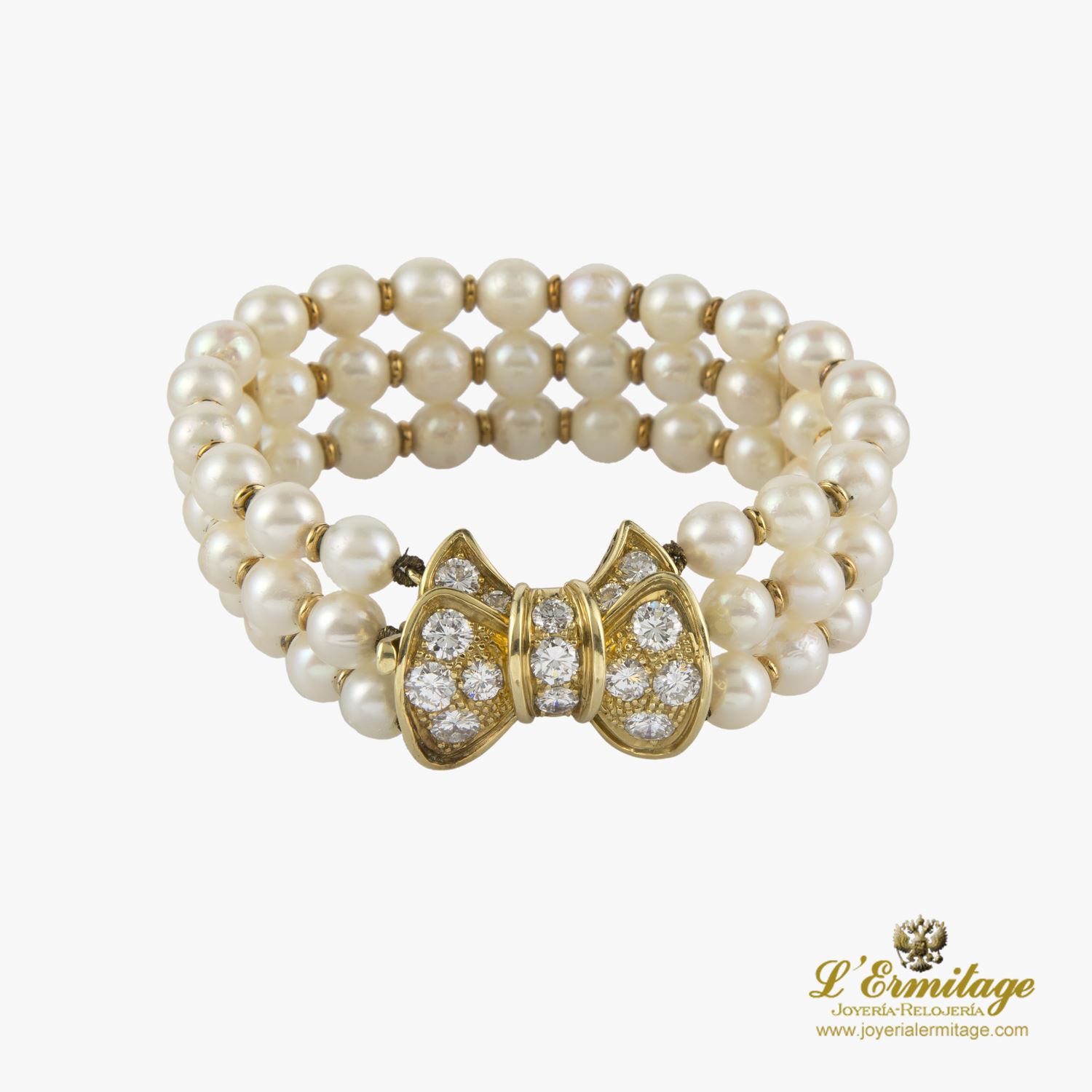 Pulsera perlas con broche de diamantes