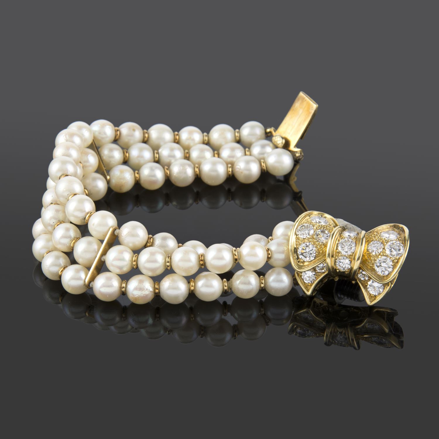 Pulsera perlas con broche de diamantes