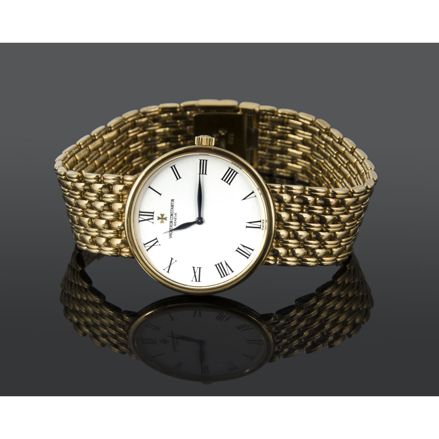 Patrimony oro amarillo cuerda manual caballero 32mm 