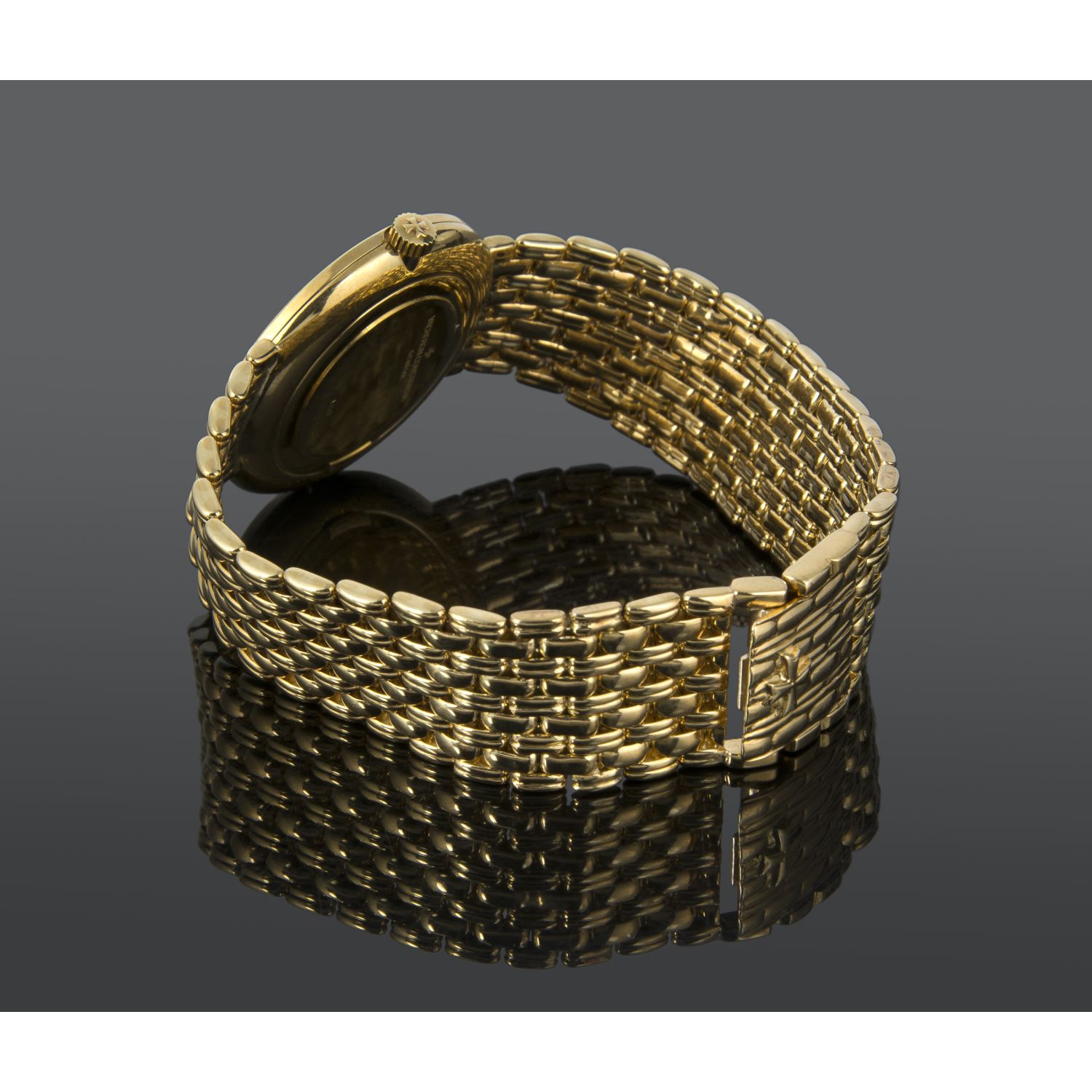 Patrimony oro amarillo cuerda manual caballero 32mm 