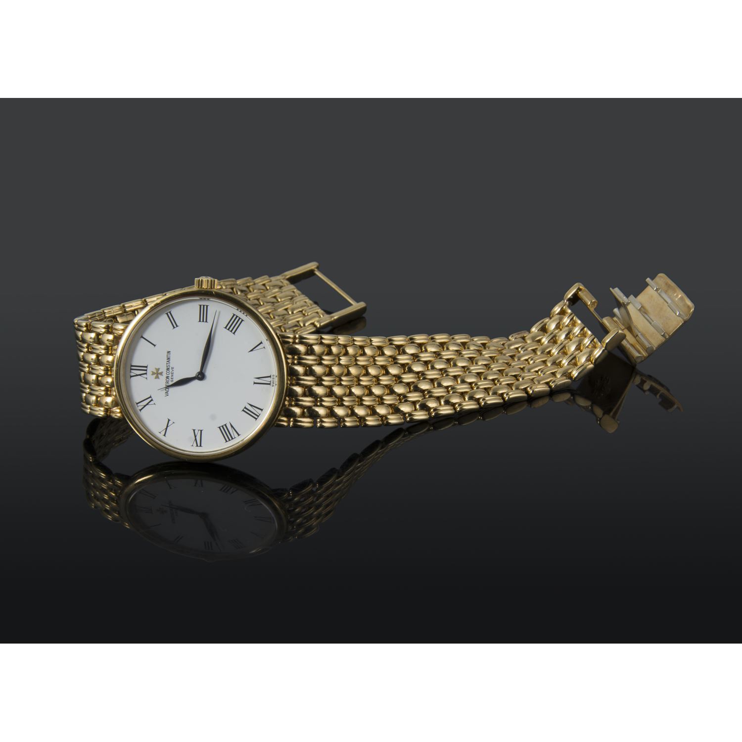 Patrimony oro amarillo cuerda manual caballero 32mm 