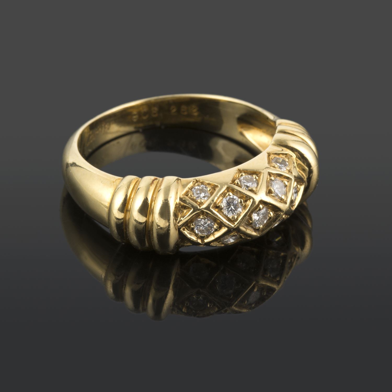 Anillo cartier oro amarillo y diamantes. Talla 54.