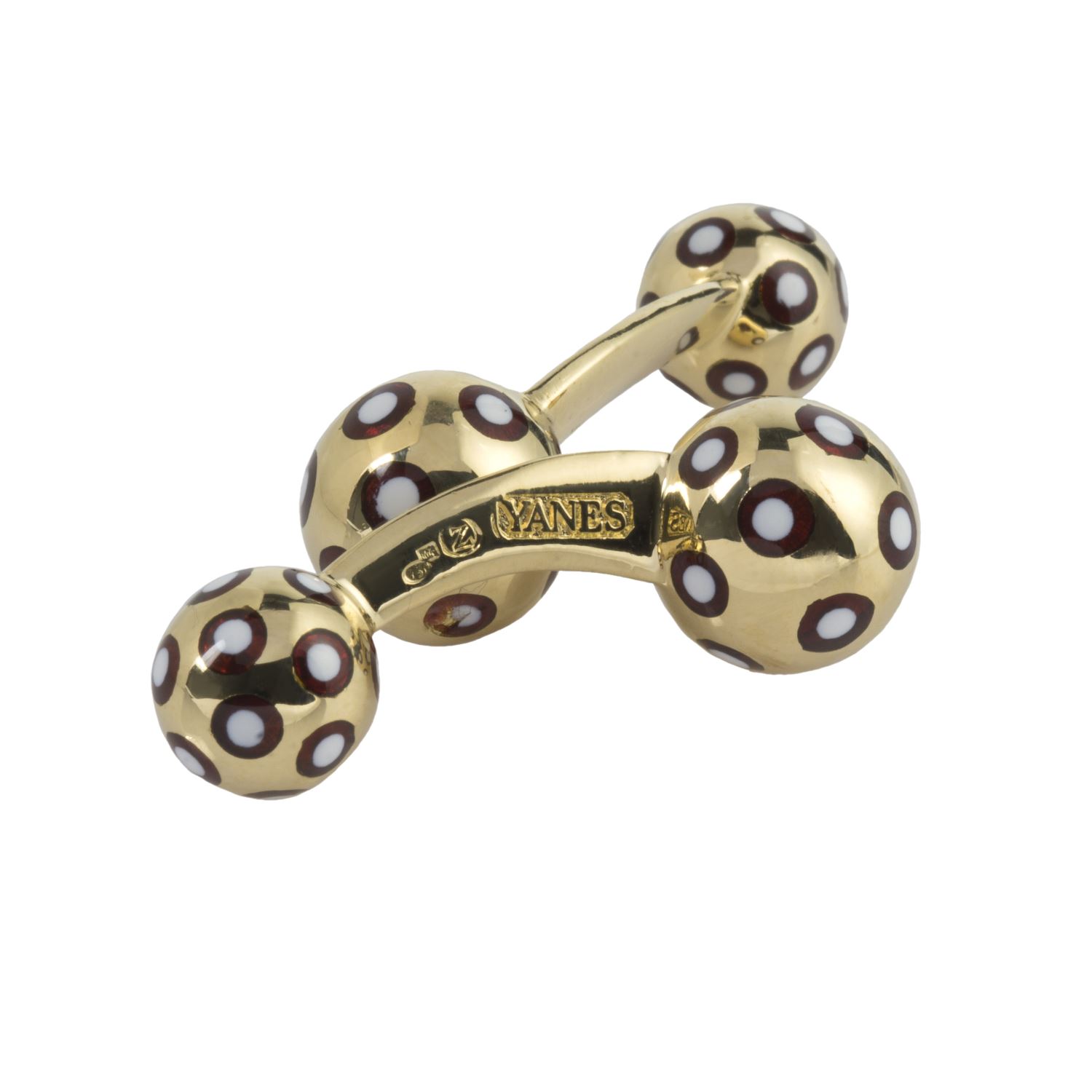 Gemelos firmados por yanes en oro amarillo y esmalte.