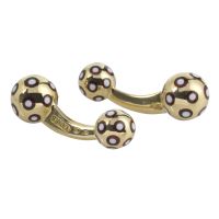 Gemelos firmados por yanes en oro amarillo y esmalte.